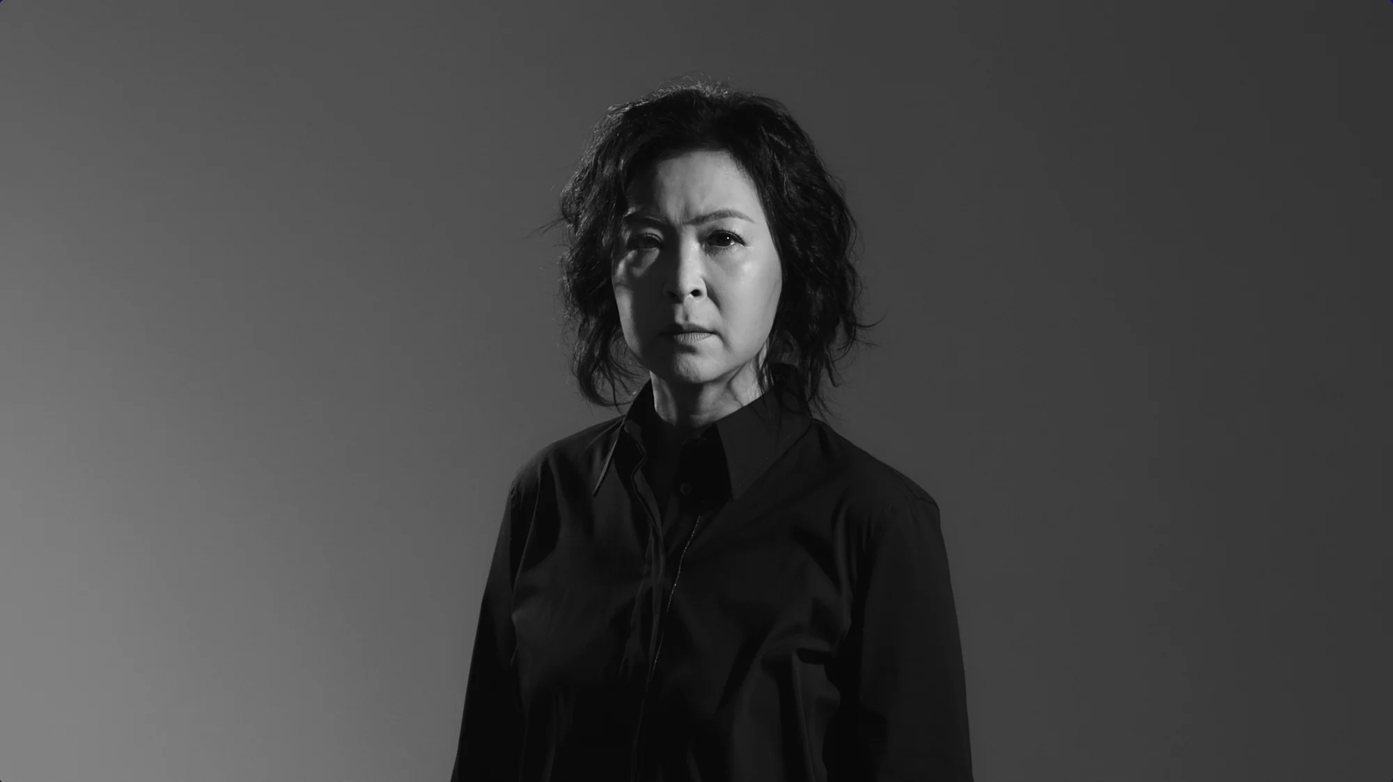 Black-and-white performer portrait from the provided Prima Facie material.
